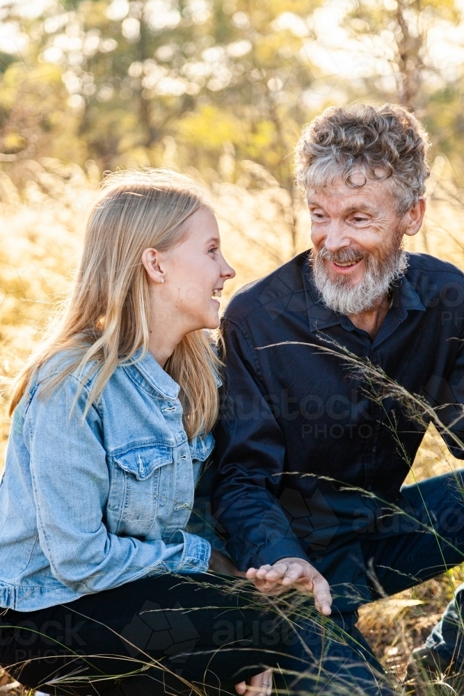 Father talking to teenage daughter - Australian Stock Image