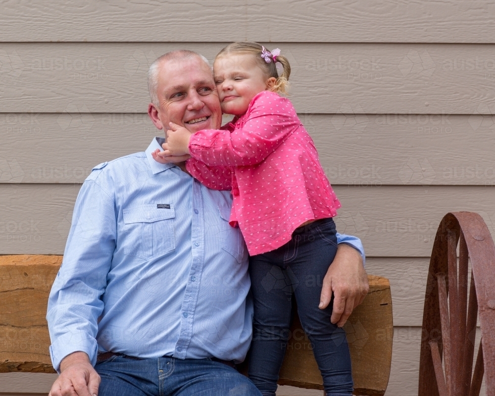 Father with little girl in pink - Australian Stock Image