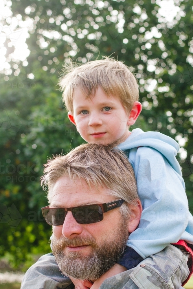 Father with son on top of shoulders - Australian Stock Image