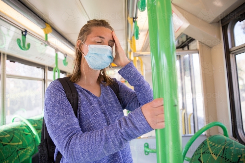 Feeling Unwell on Public Transport - Australian Stock Image