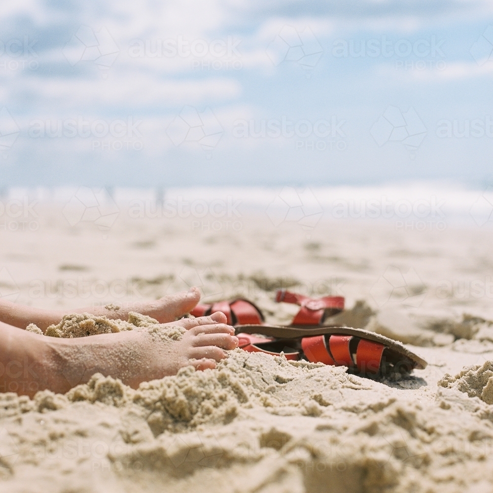 Feet in the sand at the beach - Australian Stock Image