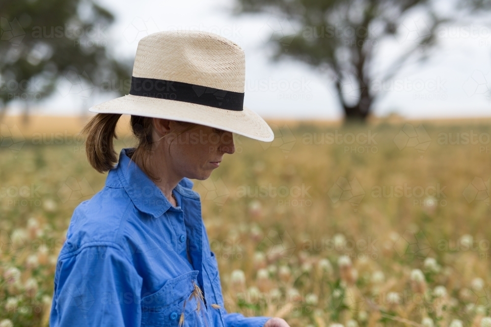 female farmer standing in a paddock - Australian Stock Image