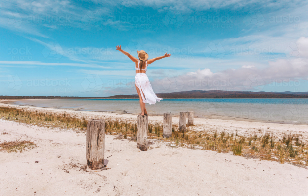 Female joy freedom live life to the full travel beach concept - Australian Stock Image