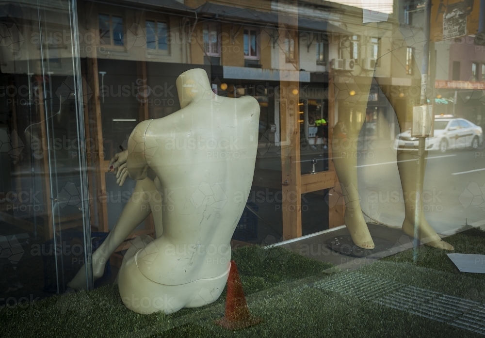 Female mannequin's back on a store. - Australian Stock Image