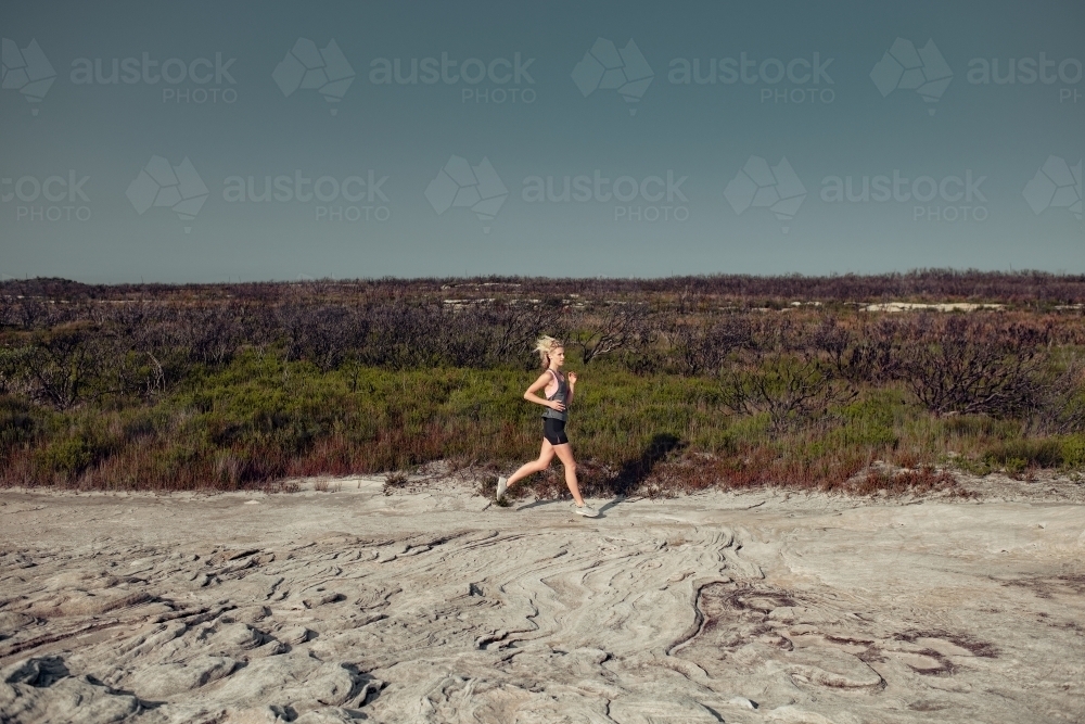 female runner in natural environmen - Australian Stock Image