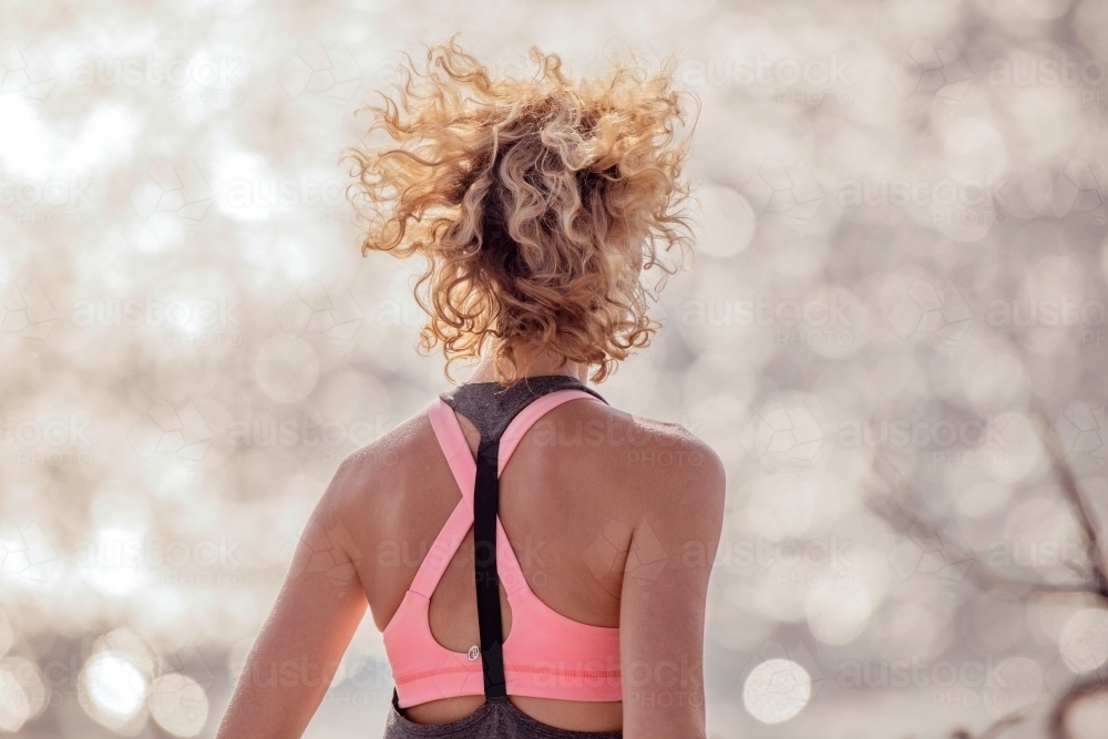 Female runner Morning Cliffside - Australian Stock Image