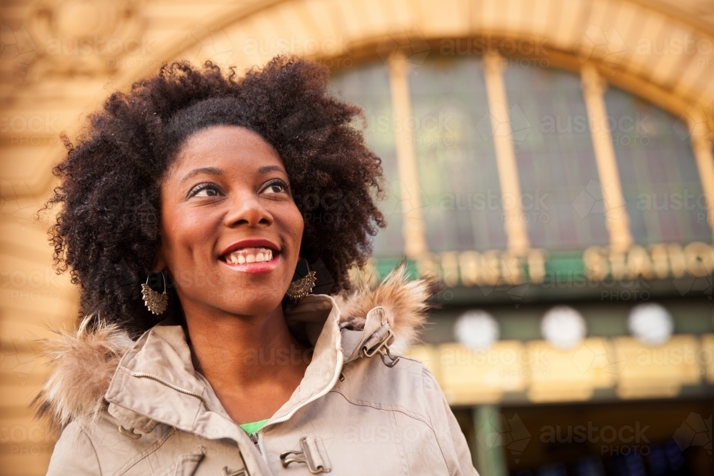 Female Tourist Outside Flinders Street Station - Australian Stock Image