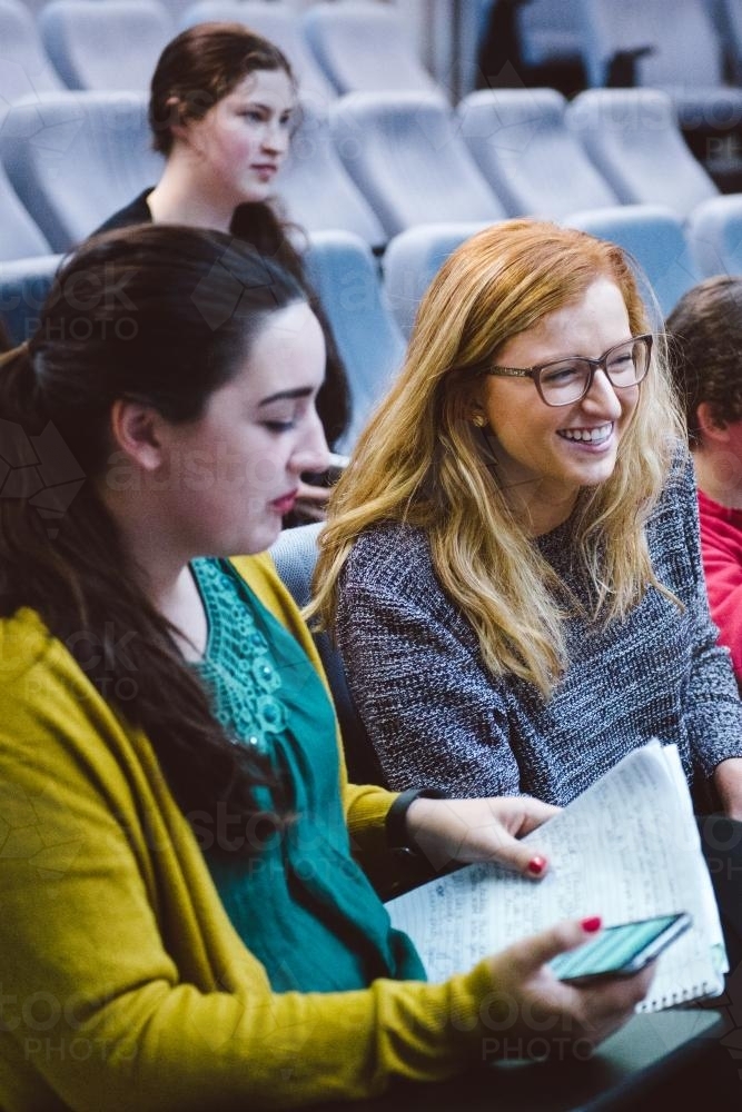 Female young adult students in a university lecture hall - Australian Stock Image