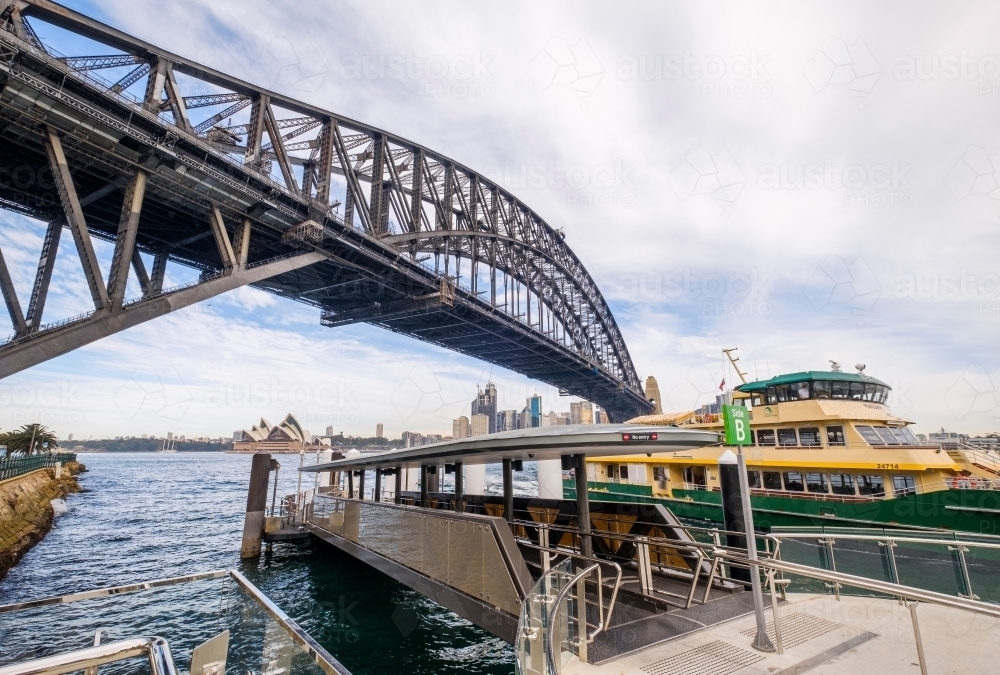 Ferry under the Sydney Harbour Bridge - Australian Stock Image