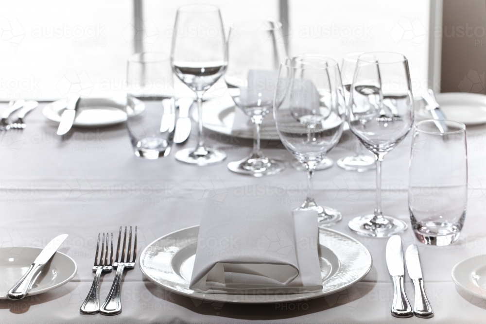Image of Fine dining table setting Austockphoto