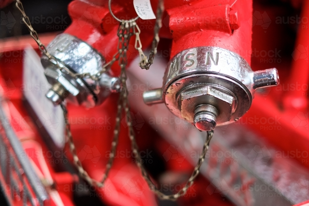 Fire hose couplings on a firetruck - Australian Stock Image