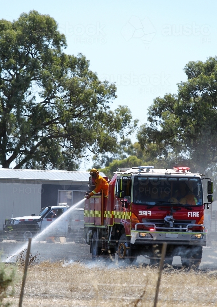Fire truck at grass fire - Australian Stock Image