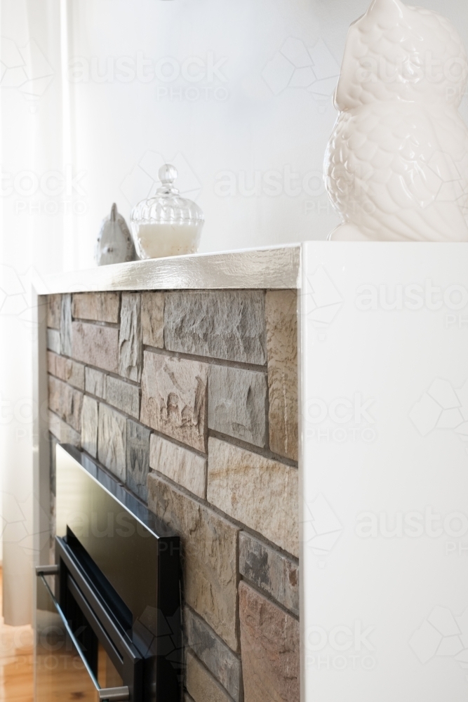 Fireplace with stone fascia - Australian Stock Image