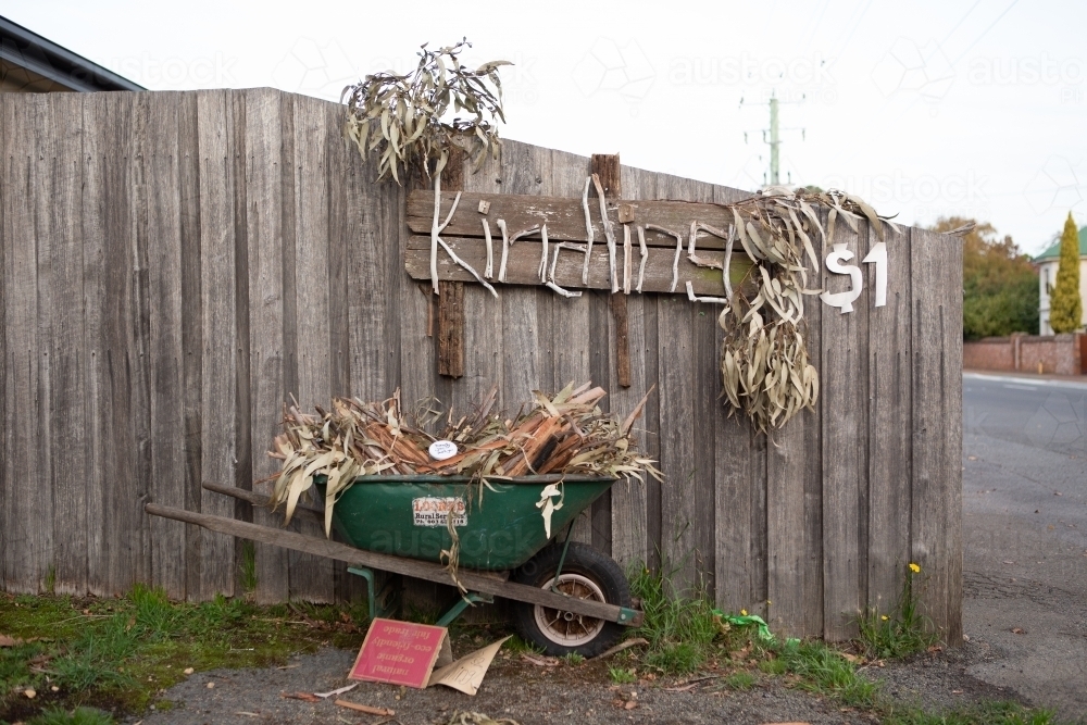 Firewood Kindling in wheel barrow - Australian Stock Image
