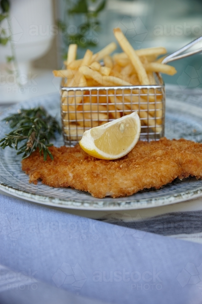 Fish and chips on table - Australian Stock Image