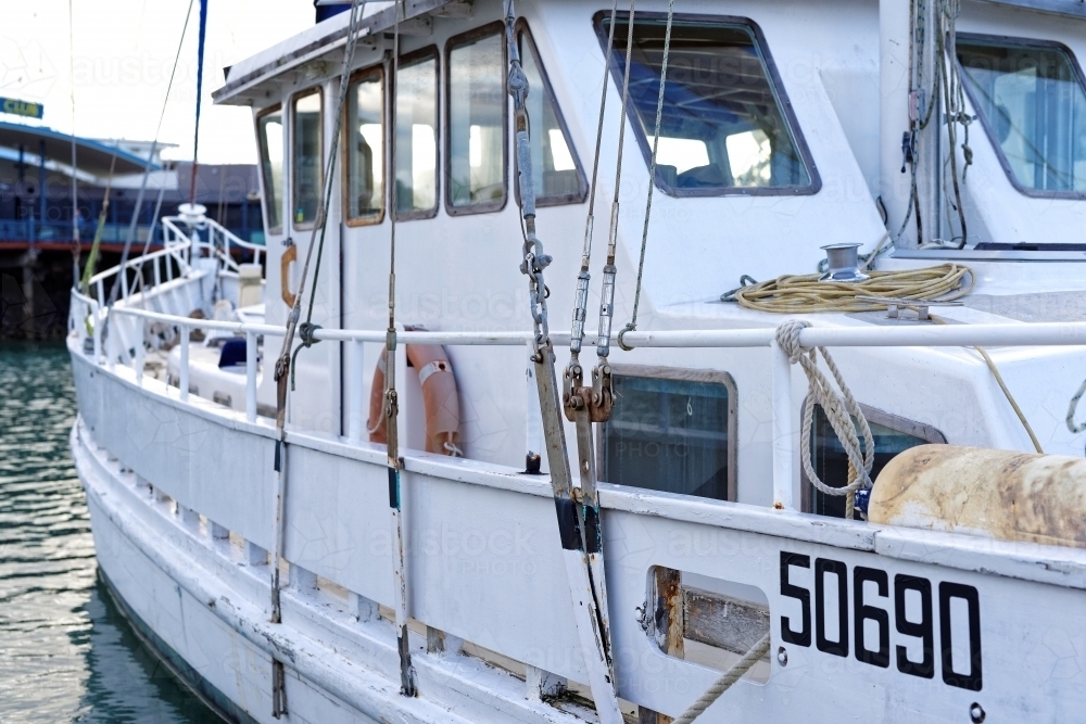 Fishing Boat anchored in the harbour at Hervey Bay Marina - Australian Stock Image