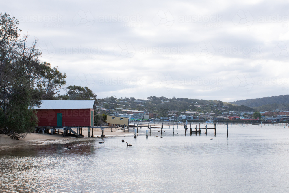Fishing huts on water in Merimbula - Australian Stock Image