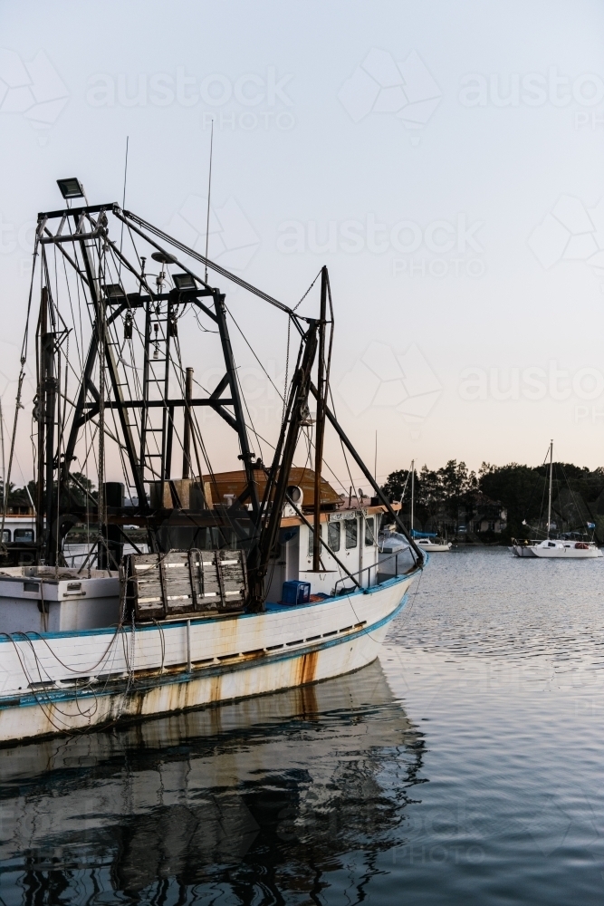 Fishing Trawler on a river - Australian Stock Image