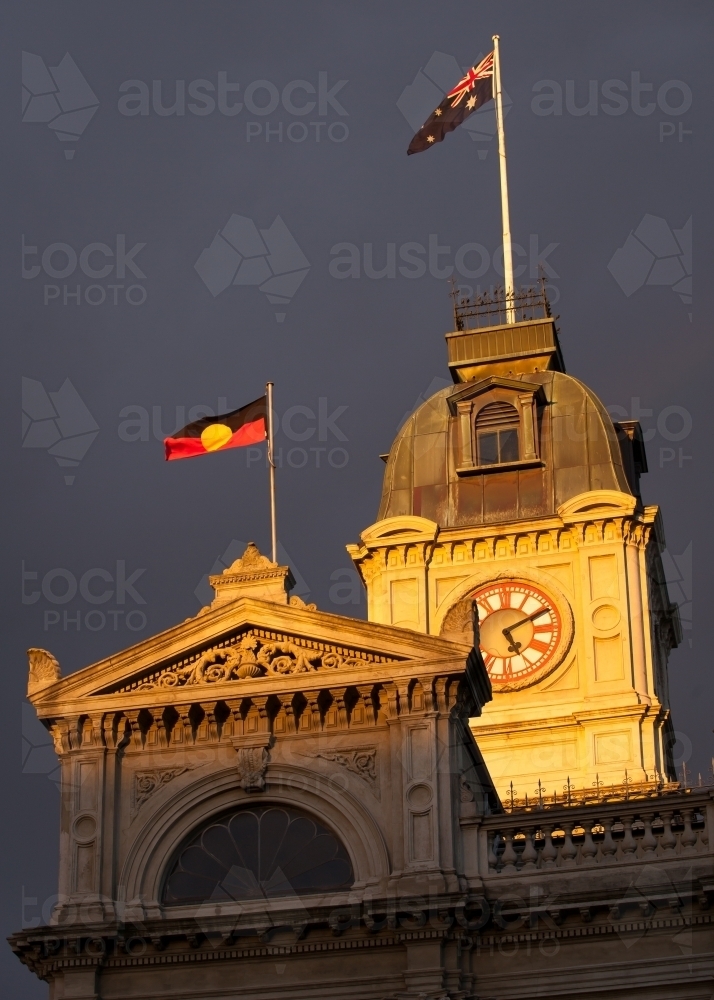 Flags flying above a heritage building - Australian Stock Image