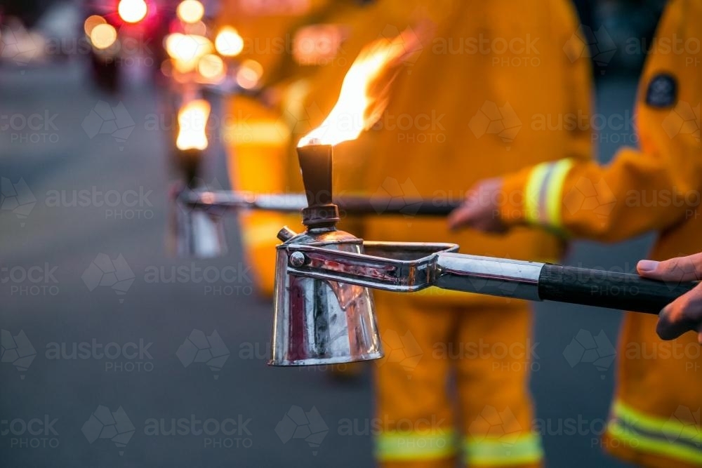 Flaming torches in a parade - Australian Stock Image