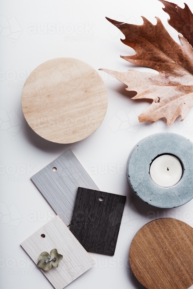 Flat lay of autumn grey and warm tone interior finishes objects - Australian Stock Image