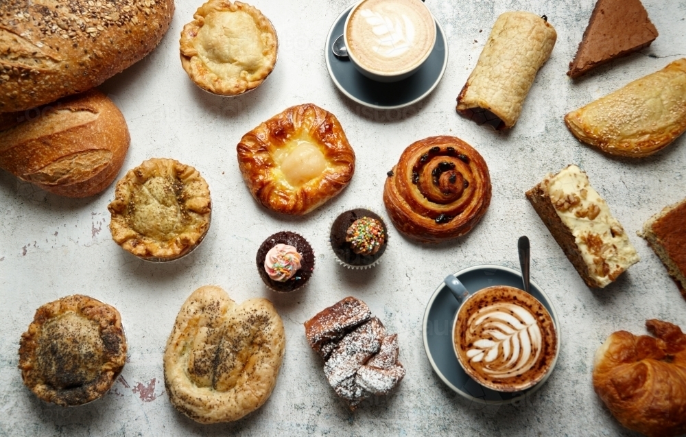 Image of Flat lay of pastries and breads and coffee Austockphoto