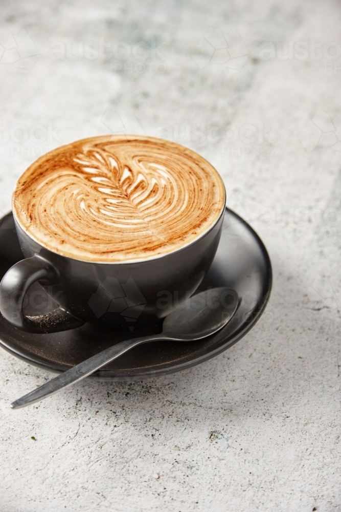 Flat white on marble background - Australian Stock Image