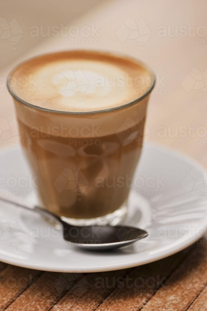 flat white or cafe latte in a glass - Australian Stock Image