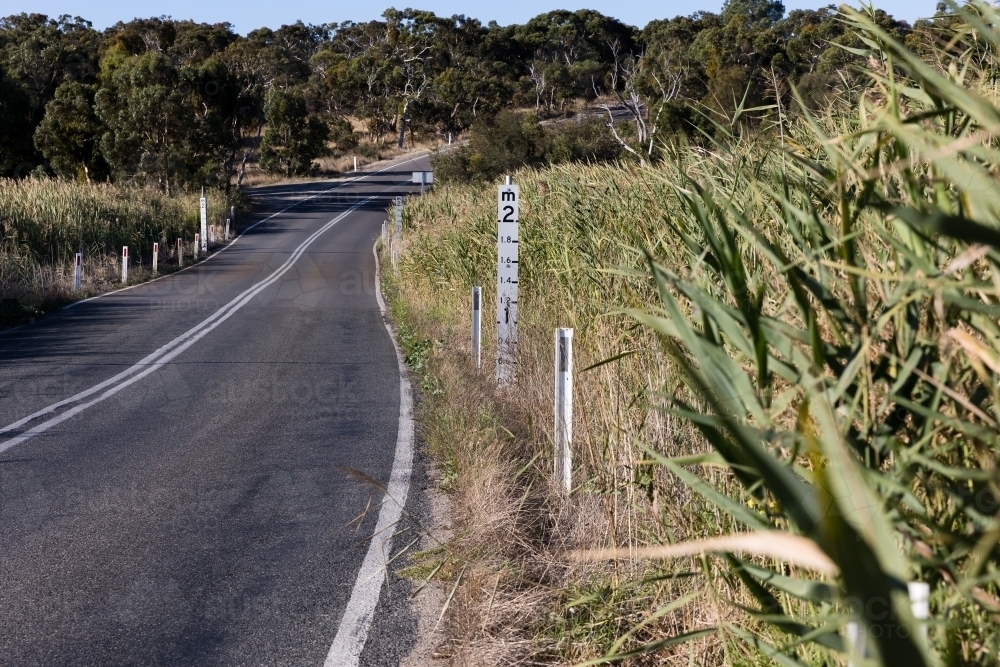 Flood Maker on Regional Road - Australian Stock Image