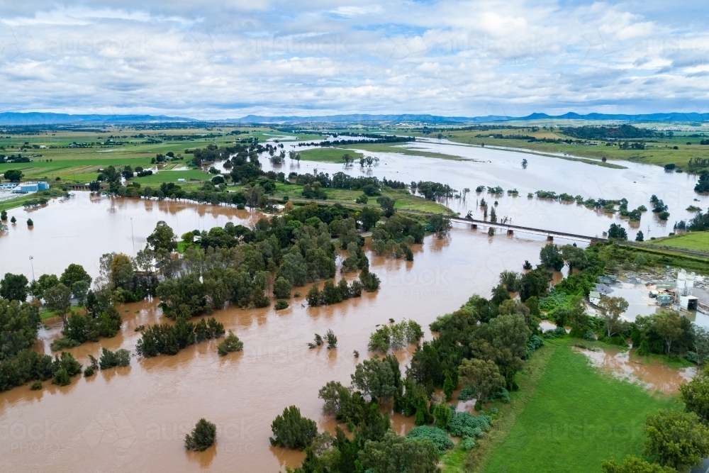 Flooded landscape on the edge of town in Hunter Valley - Australian Stock Image