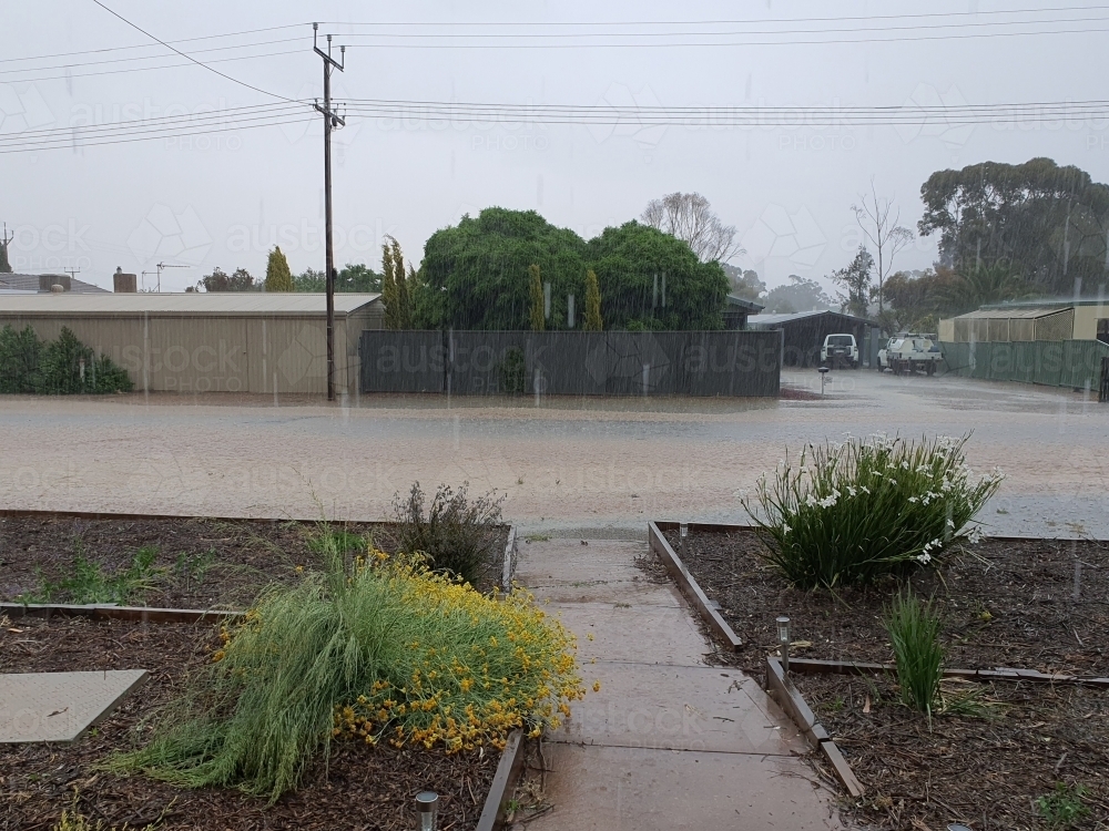 Image of flooded street in heavy rain - natural disaster - Austockphoto