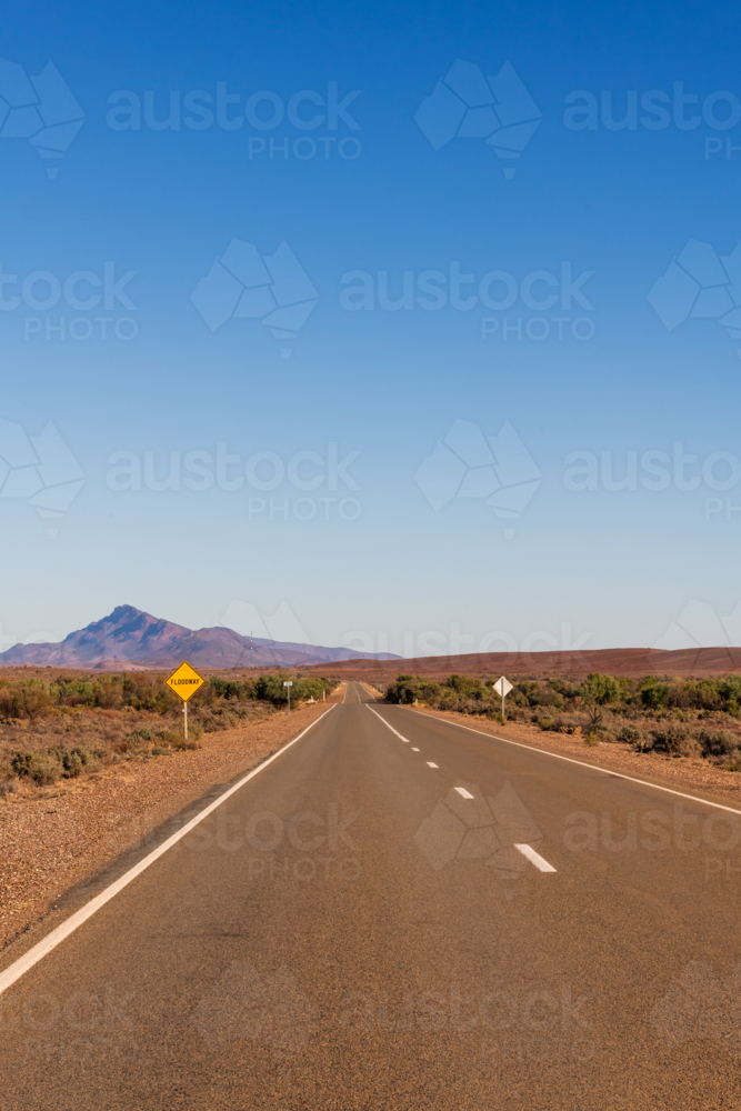 Floodway road sign on side of road, Flinders Ranges, South Australia - Australian Stock Image