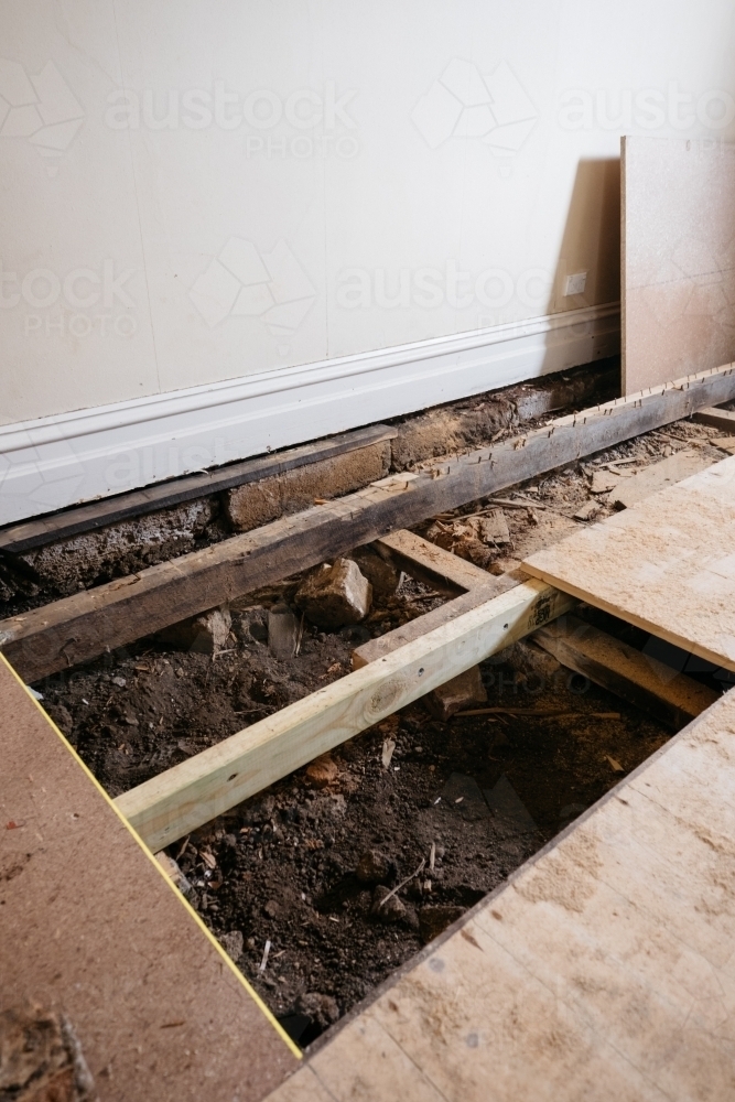 Image of Floorboards being replaced during home renovation Austockphoto