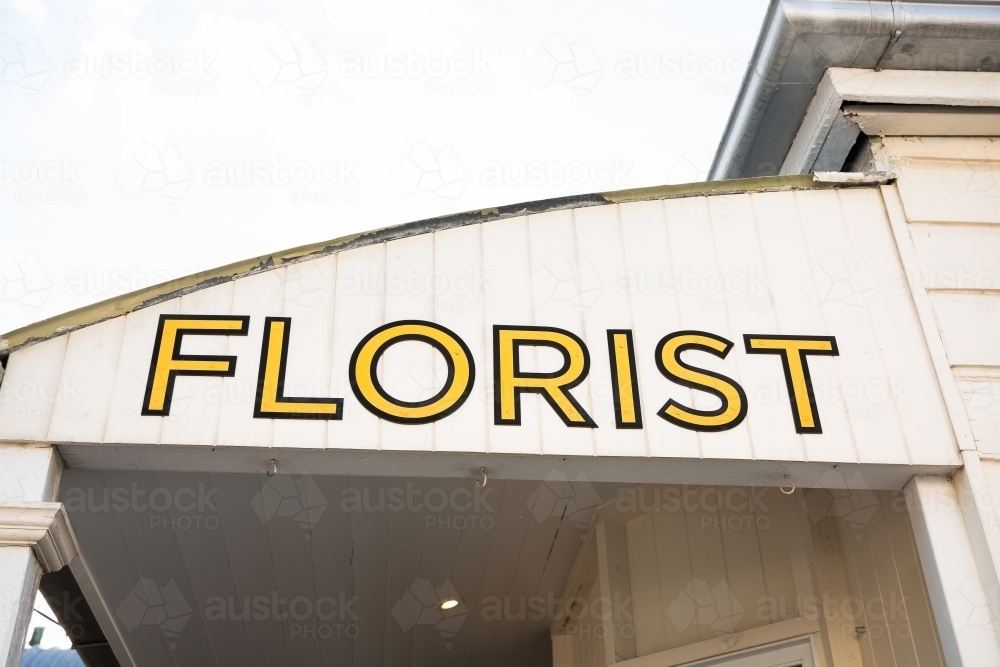 florist sign on the awning of a shop - Australian Stock Image