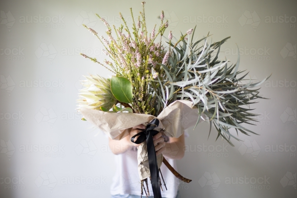 Flower arrangement in a  florist's studio - Australian Stock Image