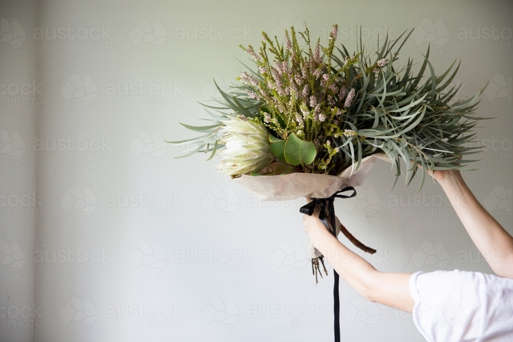 Flower arrangement in a  florist's studio - Australian Stock Image