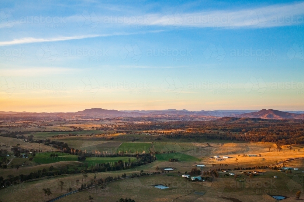 Image of Aerial landscape of farm dams and property at sunset ...