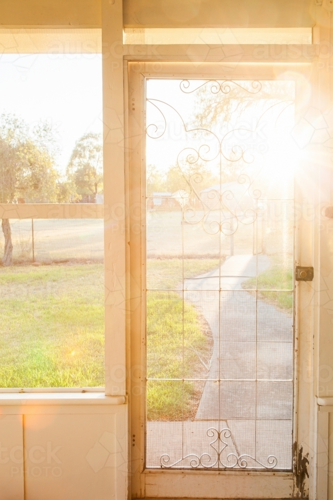 Image Of Flyscreen Door On Veranda Of Country Homestead With