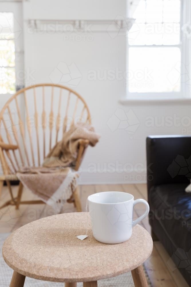 Focus on cup of tea in contemporary styled living room interior - Australian Stock Image