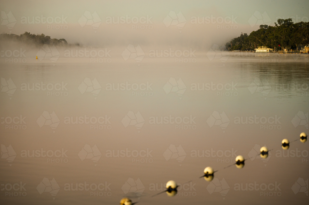 Fog mist morning on river at Mannum - Australian Stock Image
