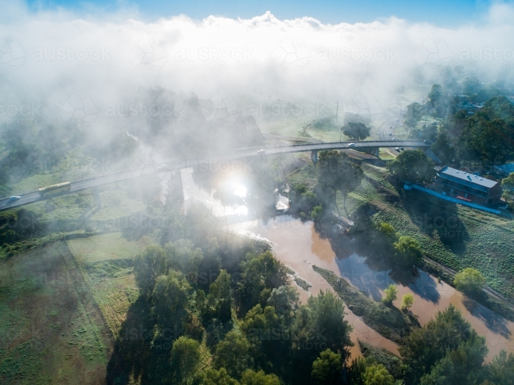 Fog over river and bridge in Singleton - Australian Stock Image