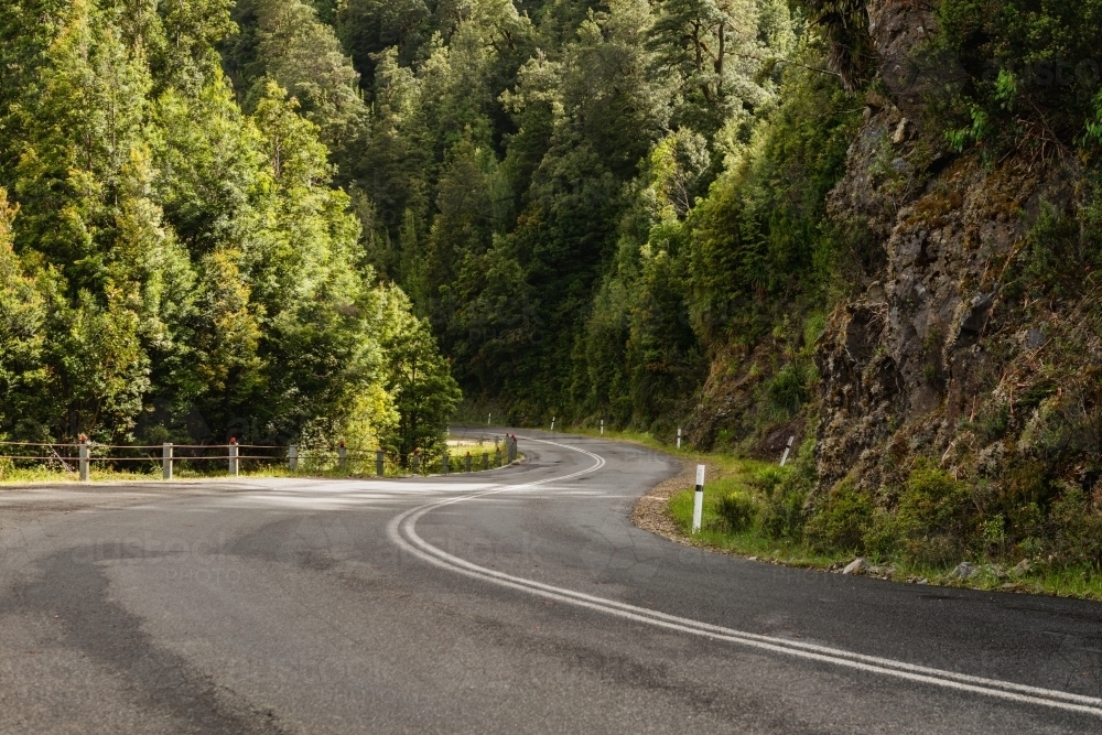 forest with curving road - Australian Stock Image