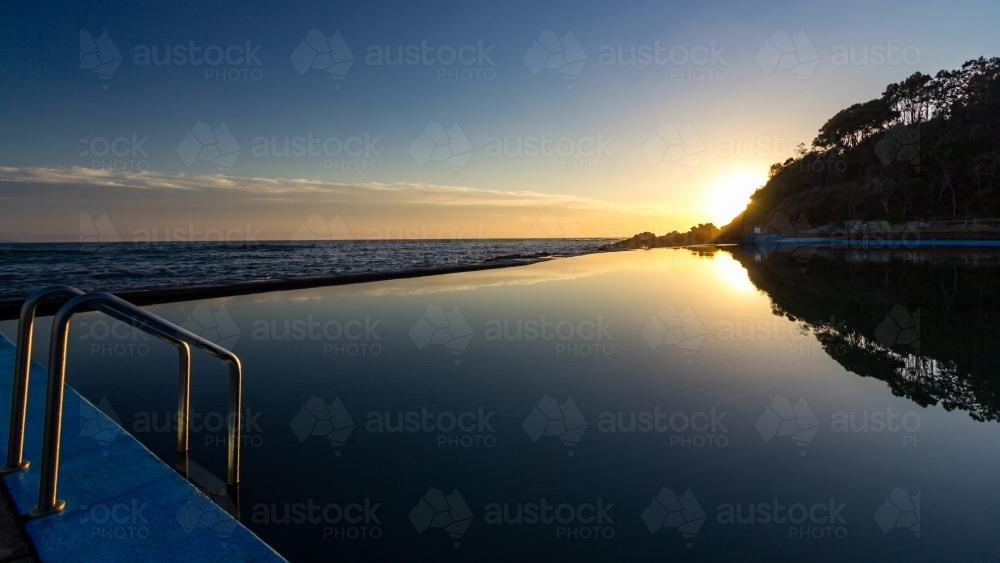 Forster Beach Baths at sunrise - Australian Stock Image