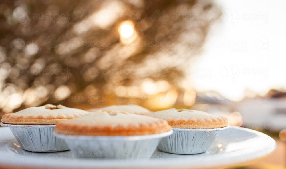 Image of Four fruit mince pies on plate for backyard Christmas party ...