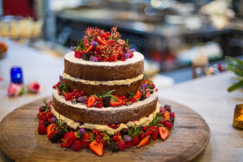 Four tier berry and cream cake - Australian Stock Image