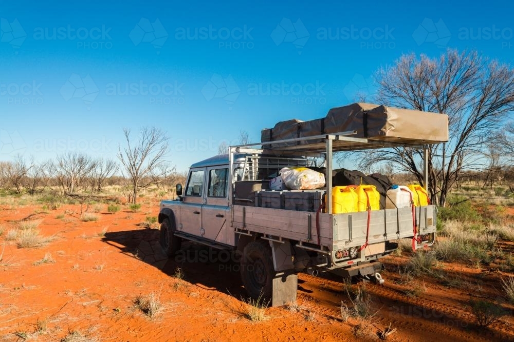 Four wheel drive loaded up ready to travel in the Outback - Australian Stock Image