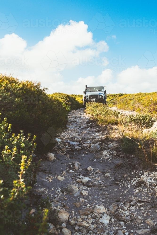 Four wheel drive truck on a rocky track - Australian Stock Image