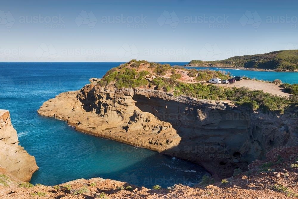 Fraser Park Headland beside the ocean on a bright day - Australian Stock Image