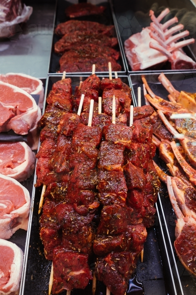 Fresh and soused meat for sale in the market. - Australian Stock Image