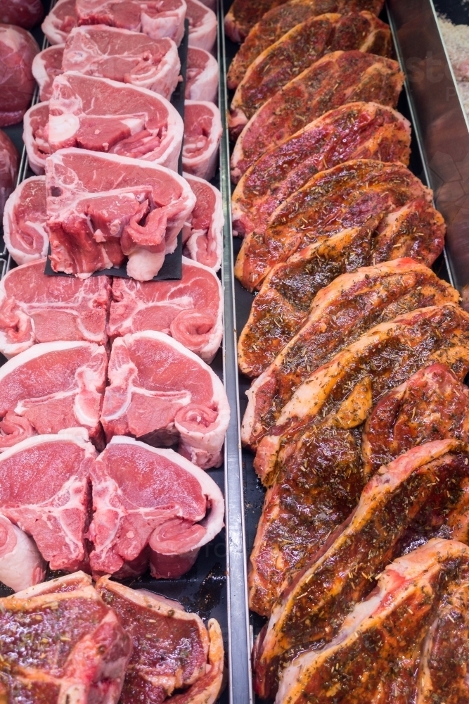 Fresh and soused meat for sale in the market. - Australian Stock Image